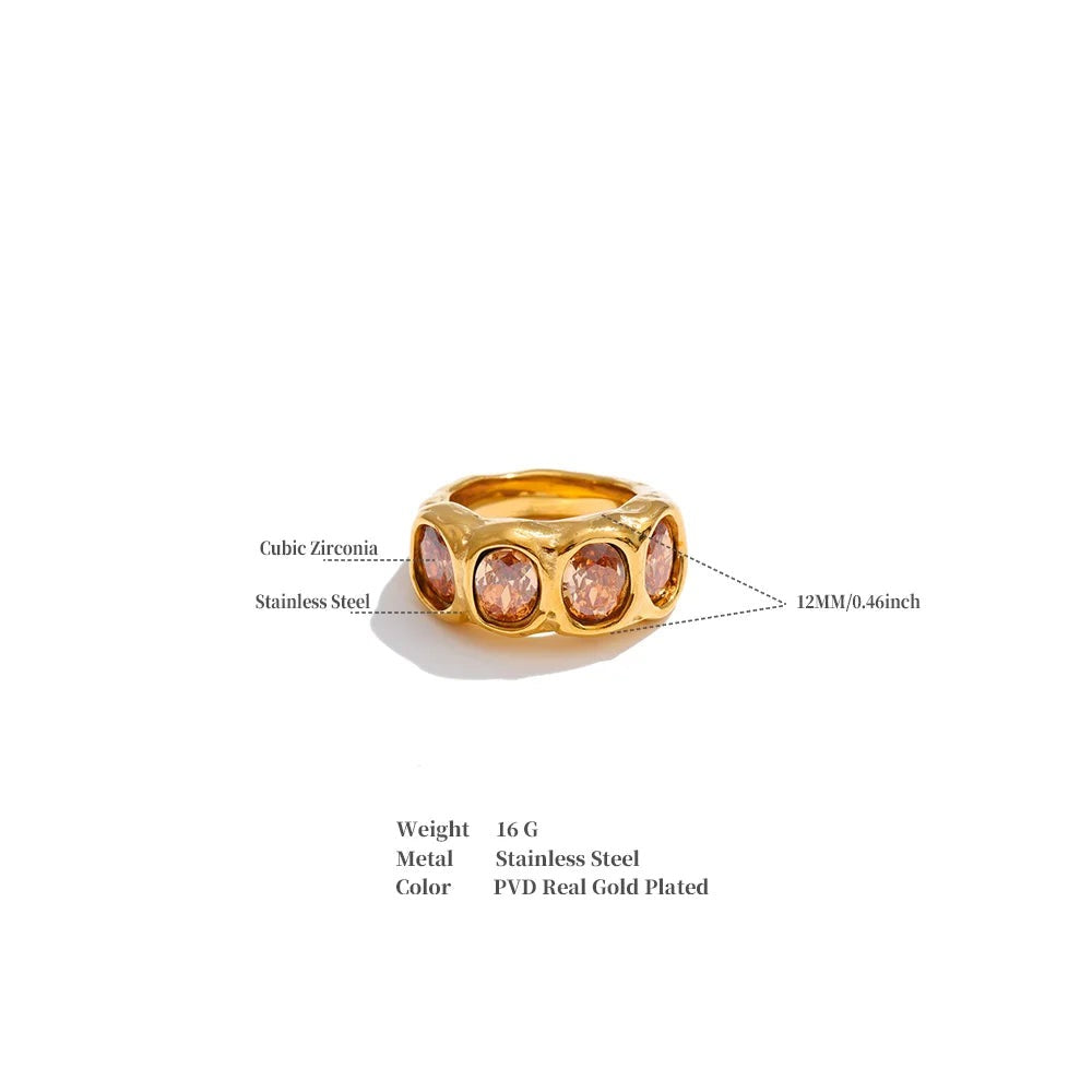 Cubic zirconia geometric ring in 18K gold-plated stainless steel with cubic zirconia.