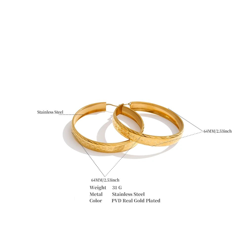Geometric earrings in gold-plated stainless steel.