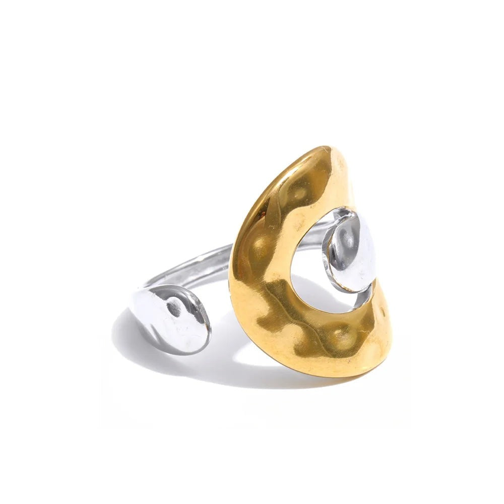 Gold-plated stainless steel ring with a unique design.