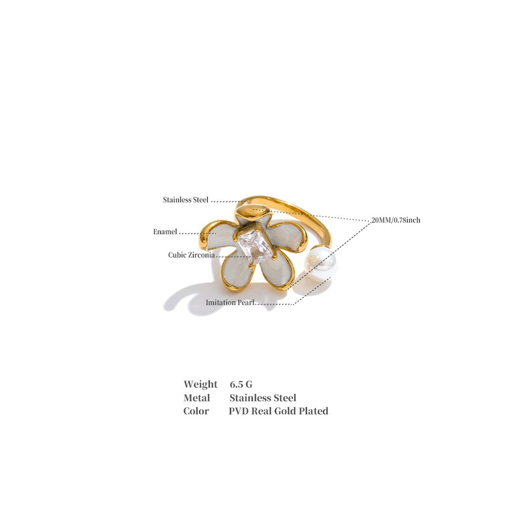 Cubic zirconia enamel flower ring in gold-plated stainless steel with cubic zirconia and enamel.