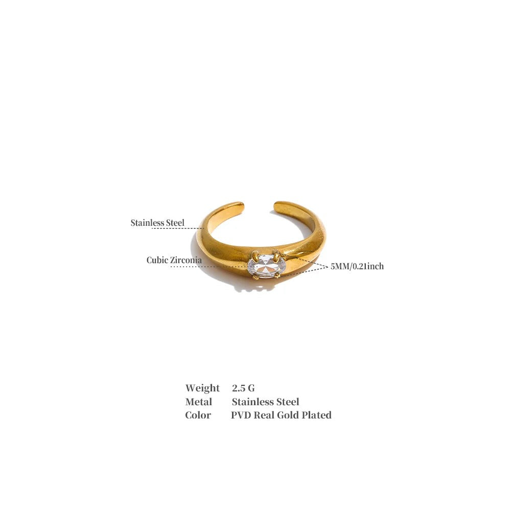 Cubic zirconia geometric ring in 18K gold-plated stainless steel with cubic zirconia.