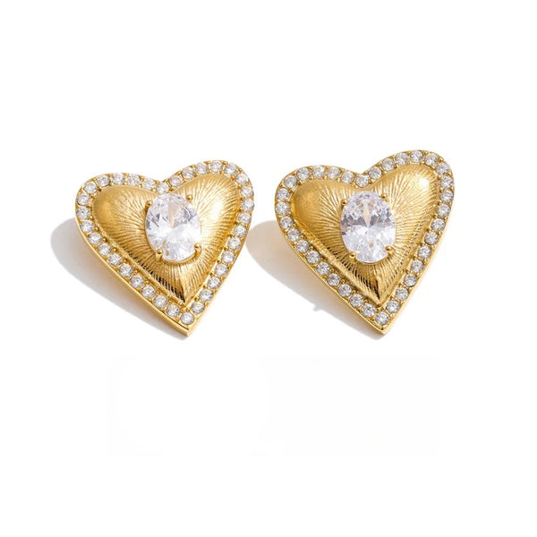Gold-plated stainless steel earrings with cubic zirconia hearts.