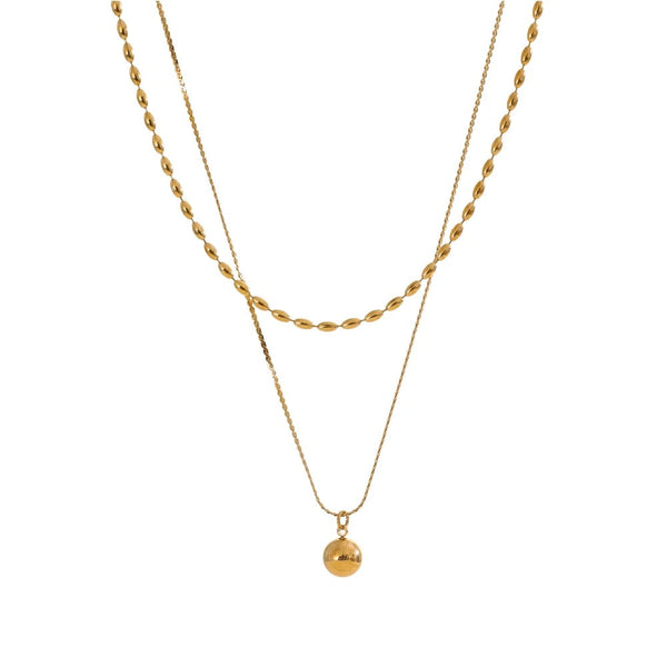 Gold-plated stainless steel necklace with a small gold pendant.