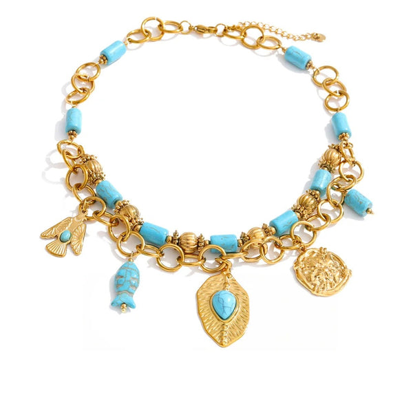 Gold-plated stainless steel necklace with turquoise stones and a blue pendant.