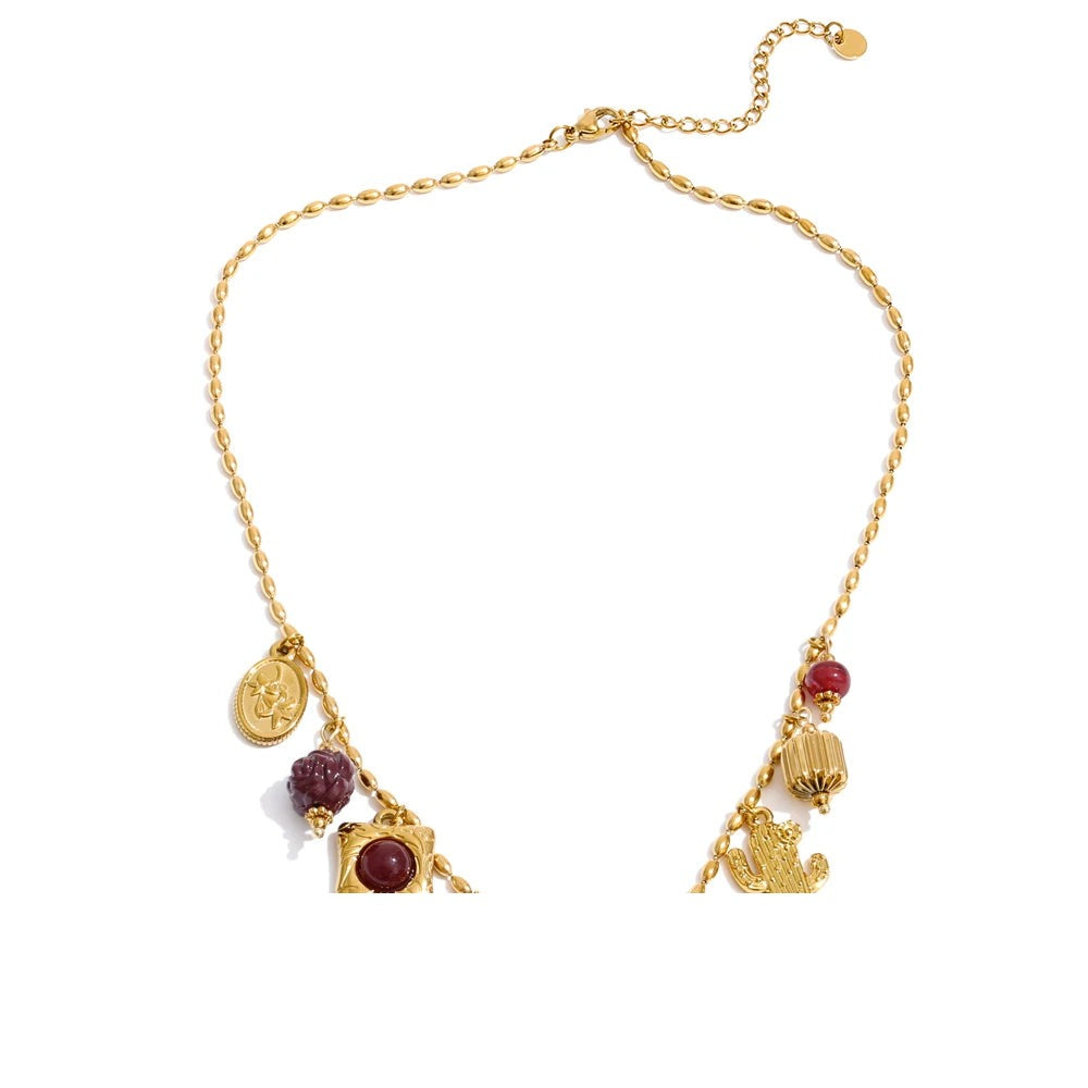 Resin acrylic cross necklace in gold-plated stainless steel with resin and acrylic.
