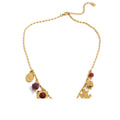 Resin acrylic cross necklace in gold-plated stainless steel with resin and acrylic.