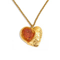Gold-plated stainless steel necklace with a red heart pendant.