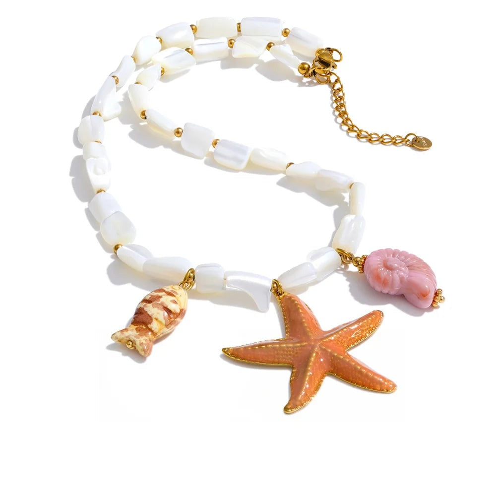 Gold-plated stainless steel necklace with shells and a starfish charm.