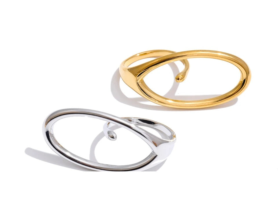 Geometric ring in 18K gold-plated stainless steel.
