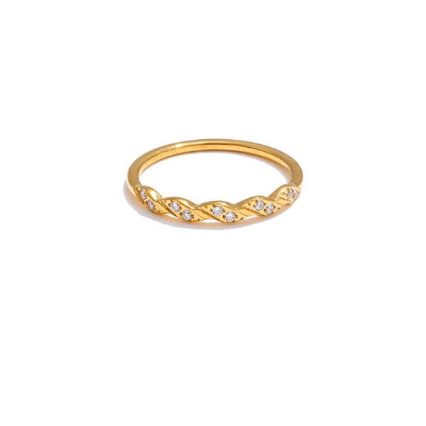 Gold-plated ring with cubic zirconia accents.