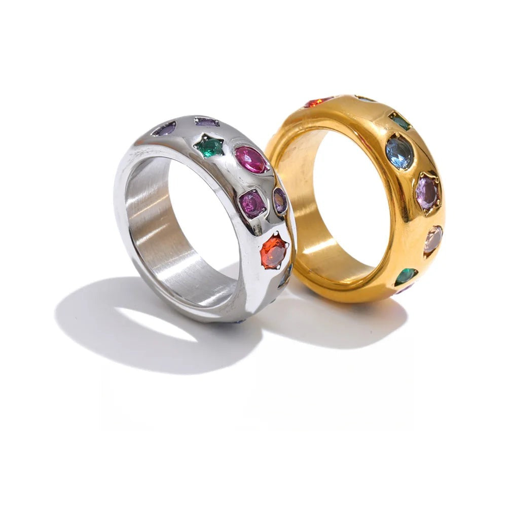 Gold-plated stainless steel ring with cubic zirconia stones.