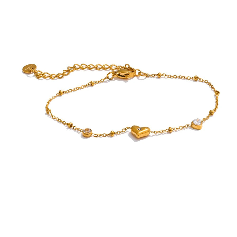 Gold-plated bracelet with cubic zirconia stones.