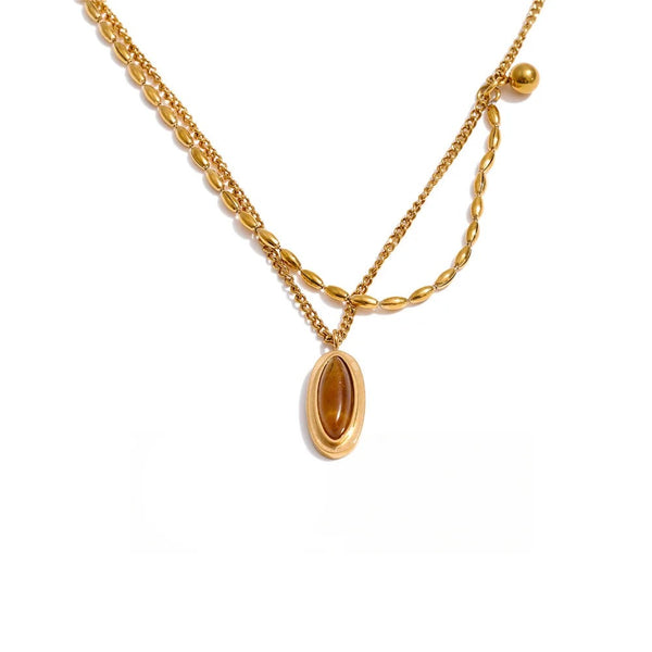 Gold-plated stainless steel necklace with a large natural stone pendant.