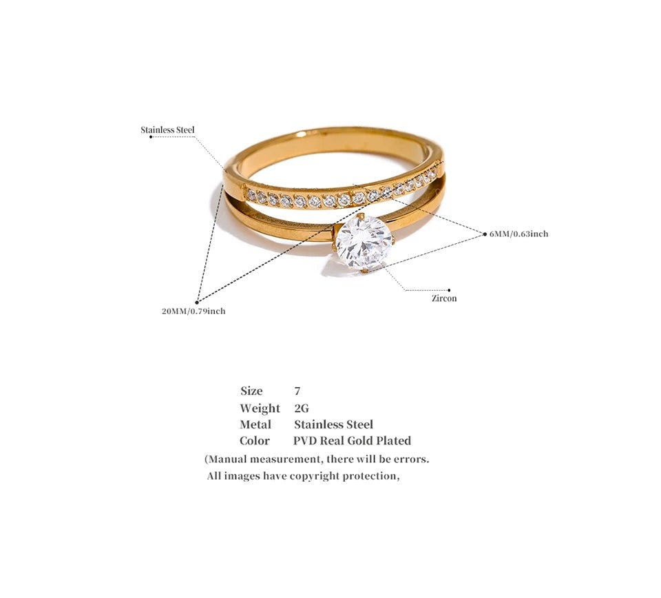 Cubic zirconia geometric layered ring in gold-plated stainless steel with cubic zirconia.