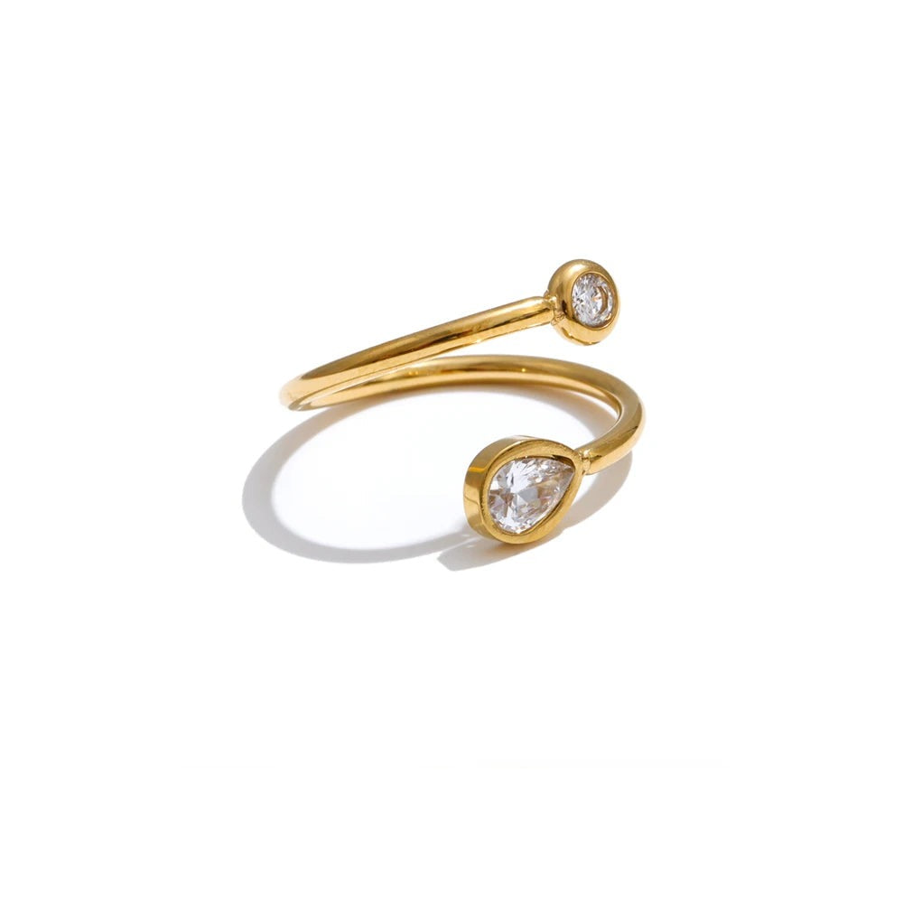 Gold-plated stainless steel ring featuring cubic zirconia stones.