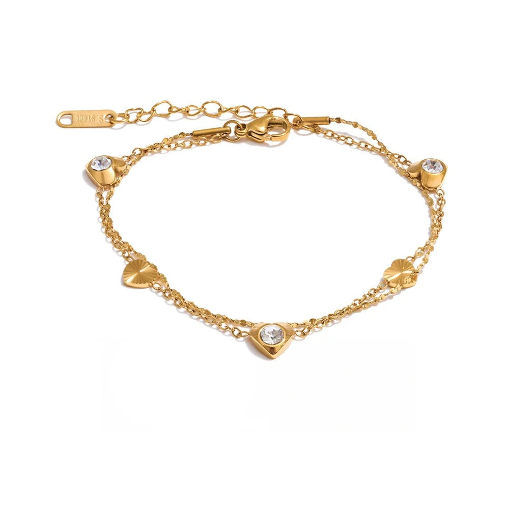 Gold-plated bracelet with cubic zirconia stones.