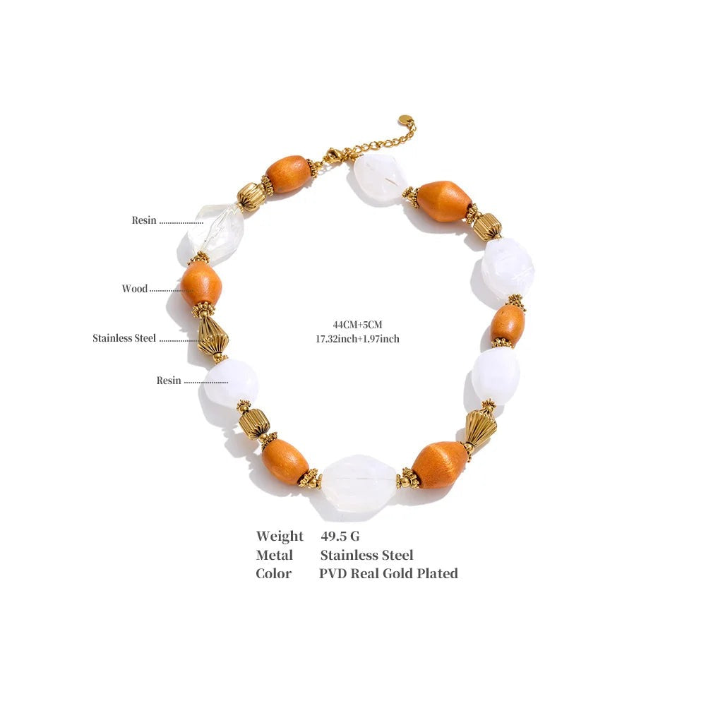Resin beaded geometric necklace in gold-plated stainless steel with resin.