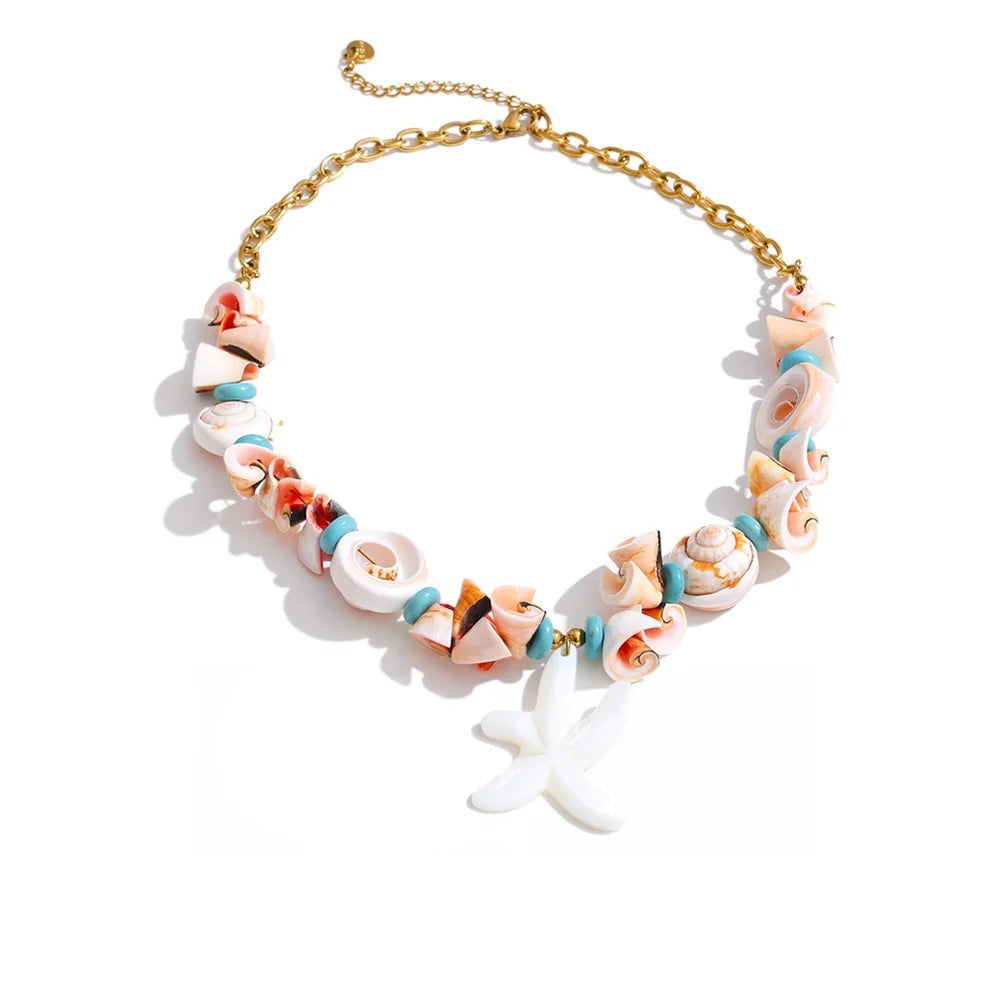 Gold-plated shell necklace with a blue and white flower design.