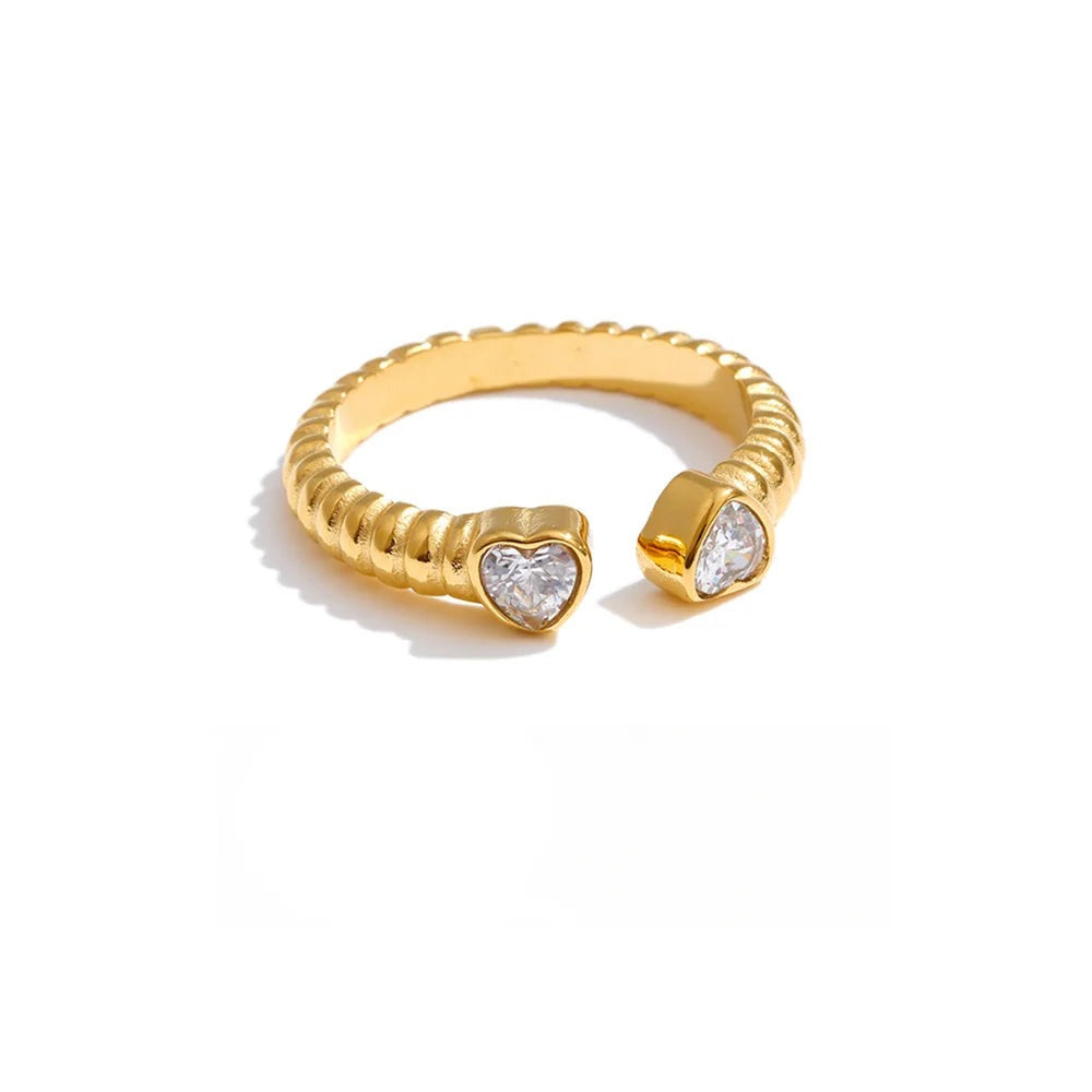 Gold-plated stainless steel ring with cubic zirconia stones.