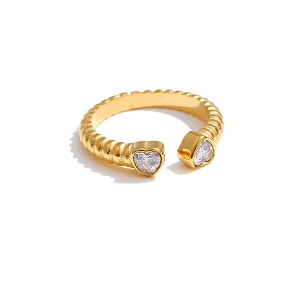 Gold-plated stainless steel ring with cubic zirconia stones.