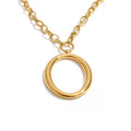 Gold-plated stainless steel necklace featuring a large ring pendant.