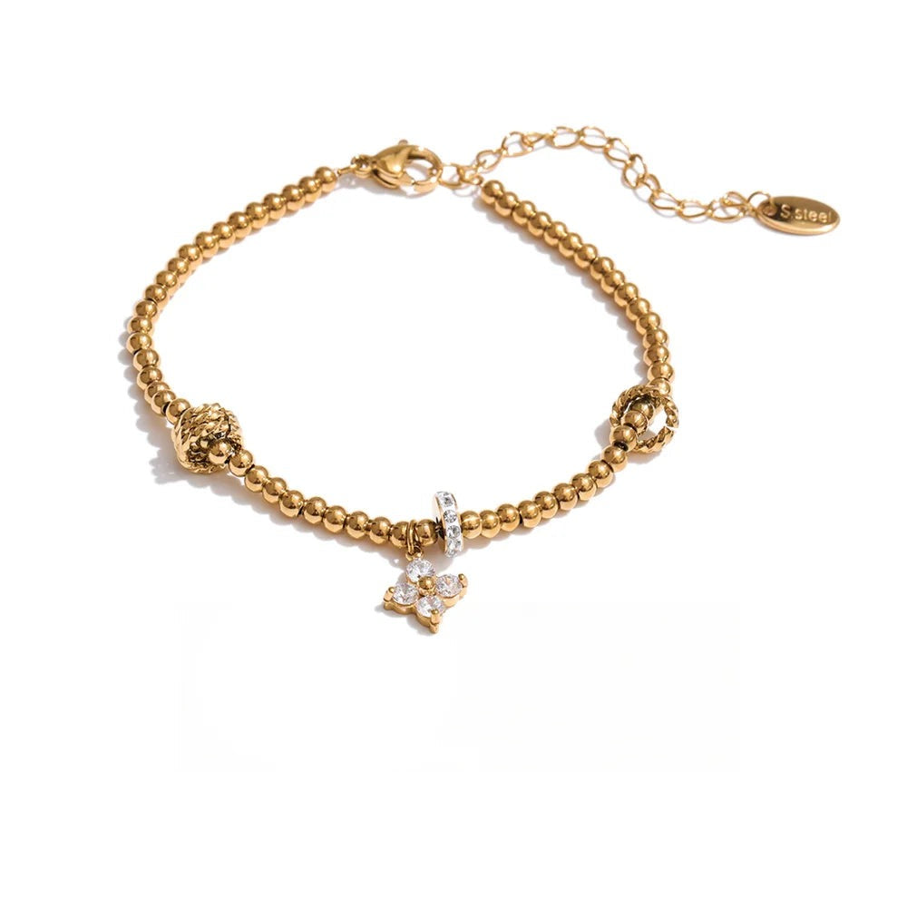 Cubic Zirconia Flower Beaded Bracelet — Gold-Plated Stainless Steel with Cubic Zirconia · PS1066