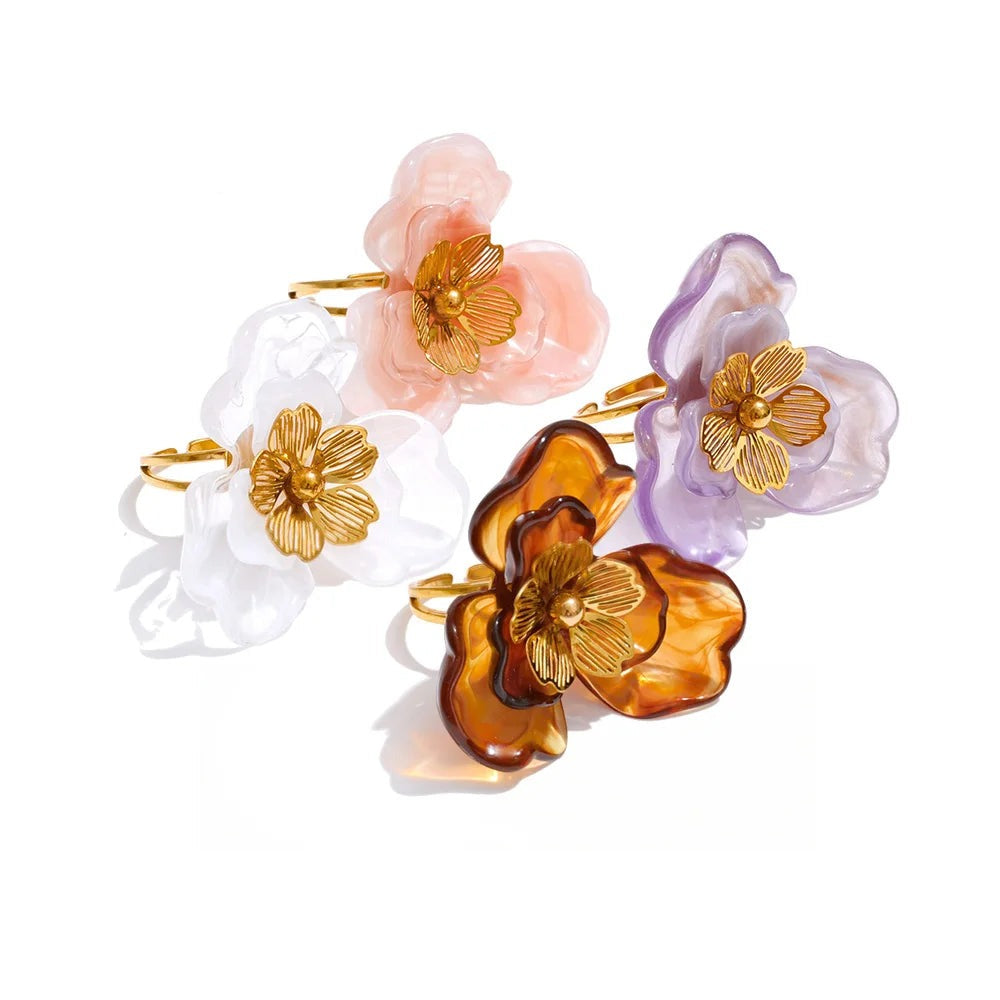 Gold-plated stainless steel ring with resin flower accents.
