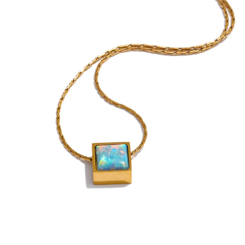 Gold-plated stainless steel necklace with a blue opal pendant.