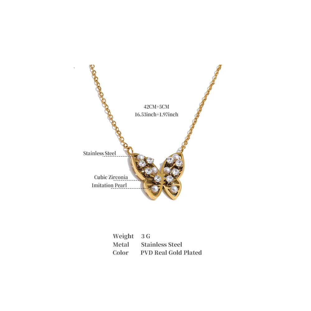 Cubic zirconia pearl butterfly necklace in gold-plated stainless steel with pearl and cubic zirconia.