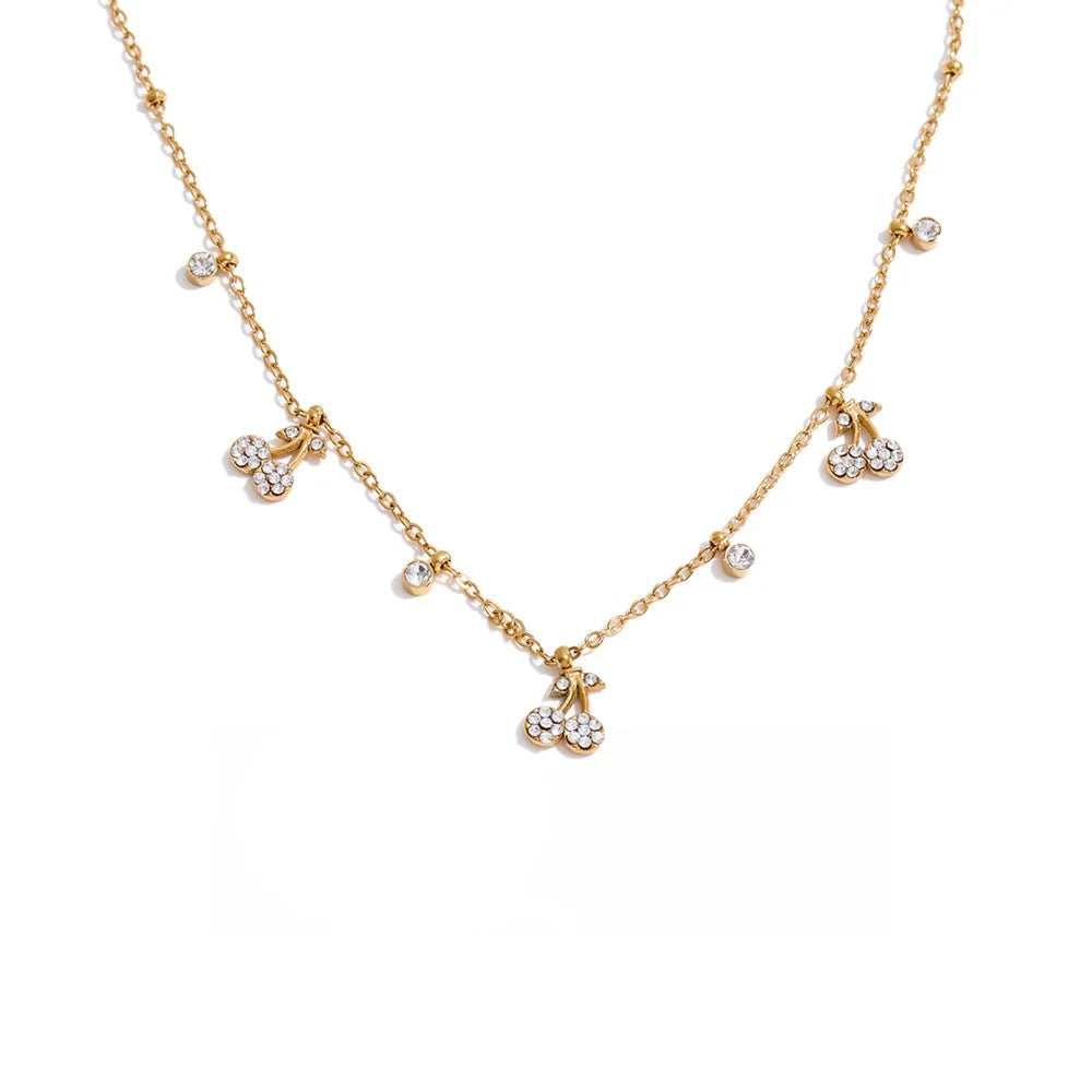 Gold-plated stainless steel necklace with cubic zirconia charms.