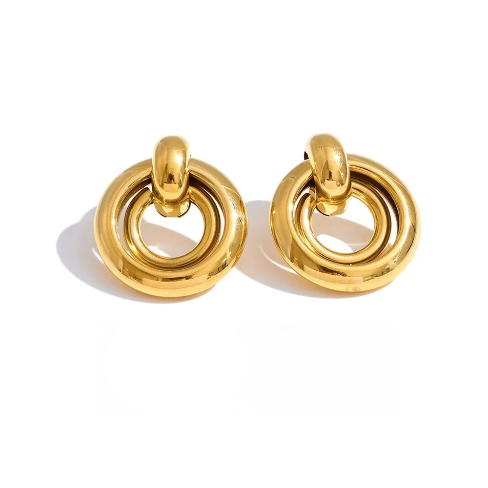 Gold-plated stainless steel earrings with a large circular hoop design.