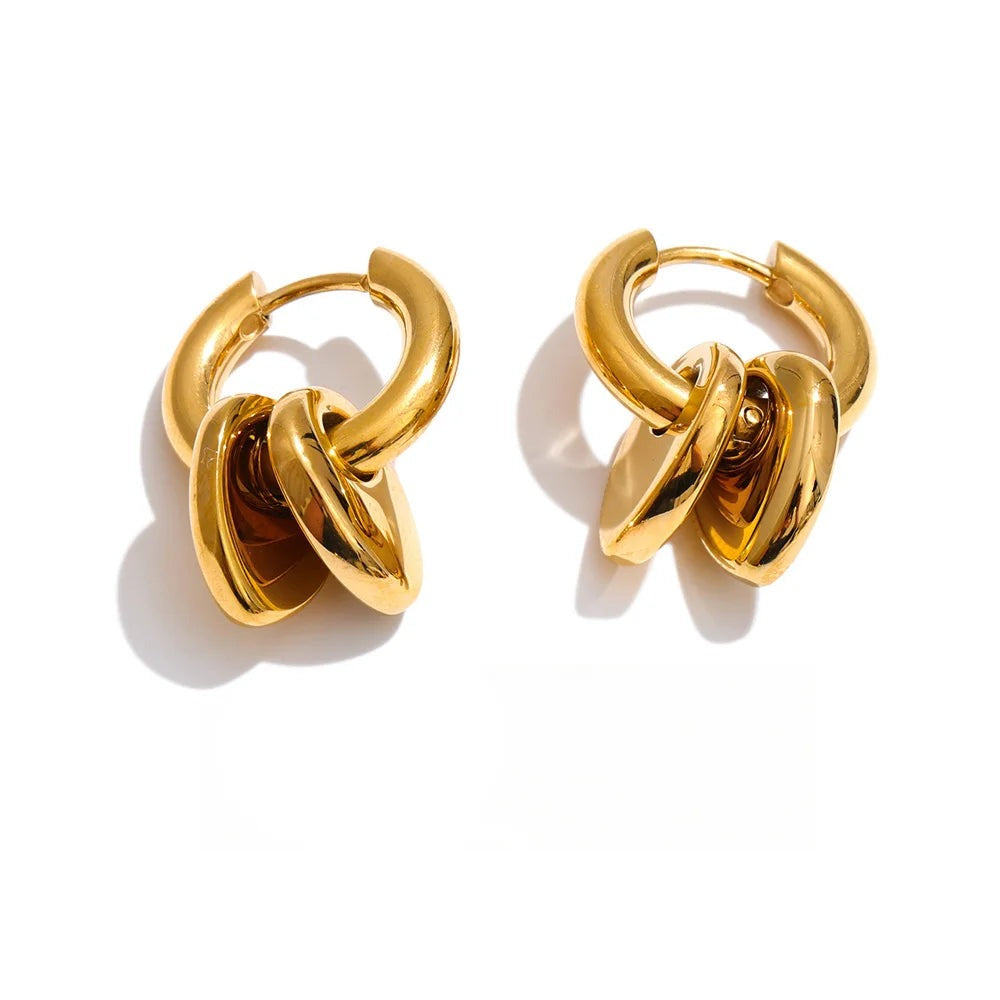 Gold-plated stainless steel earrings with a unique swirl design.