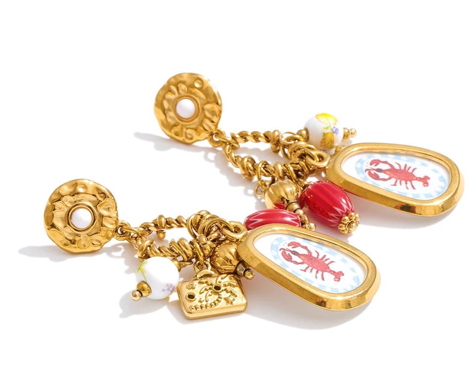 Geometric earrings in gold-plated stainless steel.