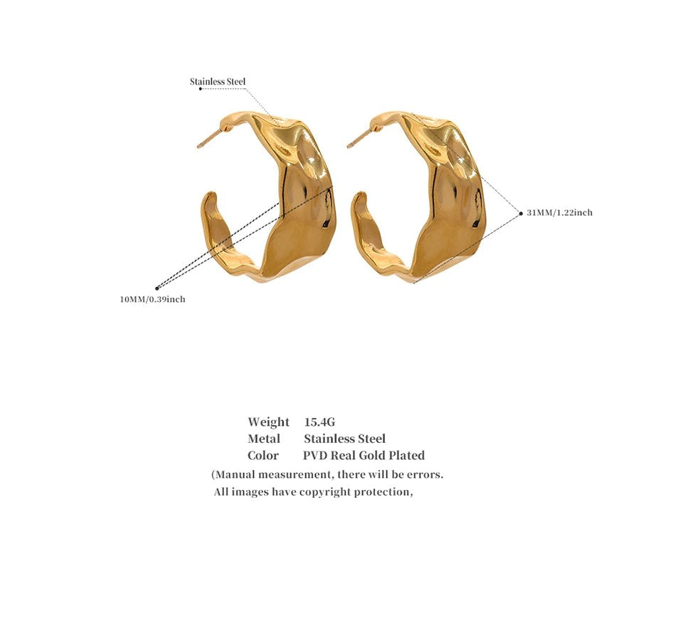 Geometric earrings in gold-plated 316L stainless steel.