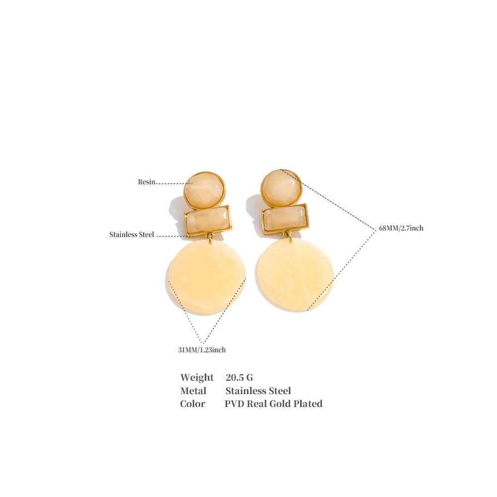 Resin geometric earrings in gold-plated stainless steel with resin.