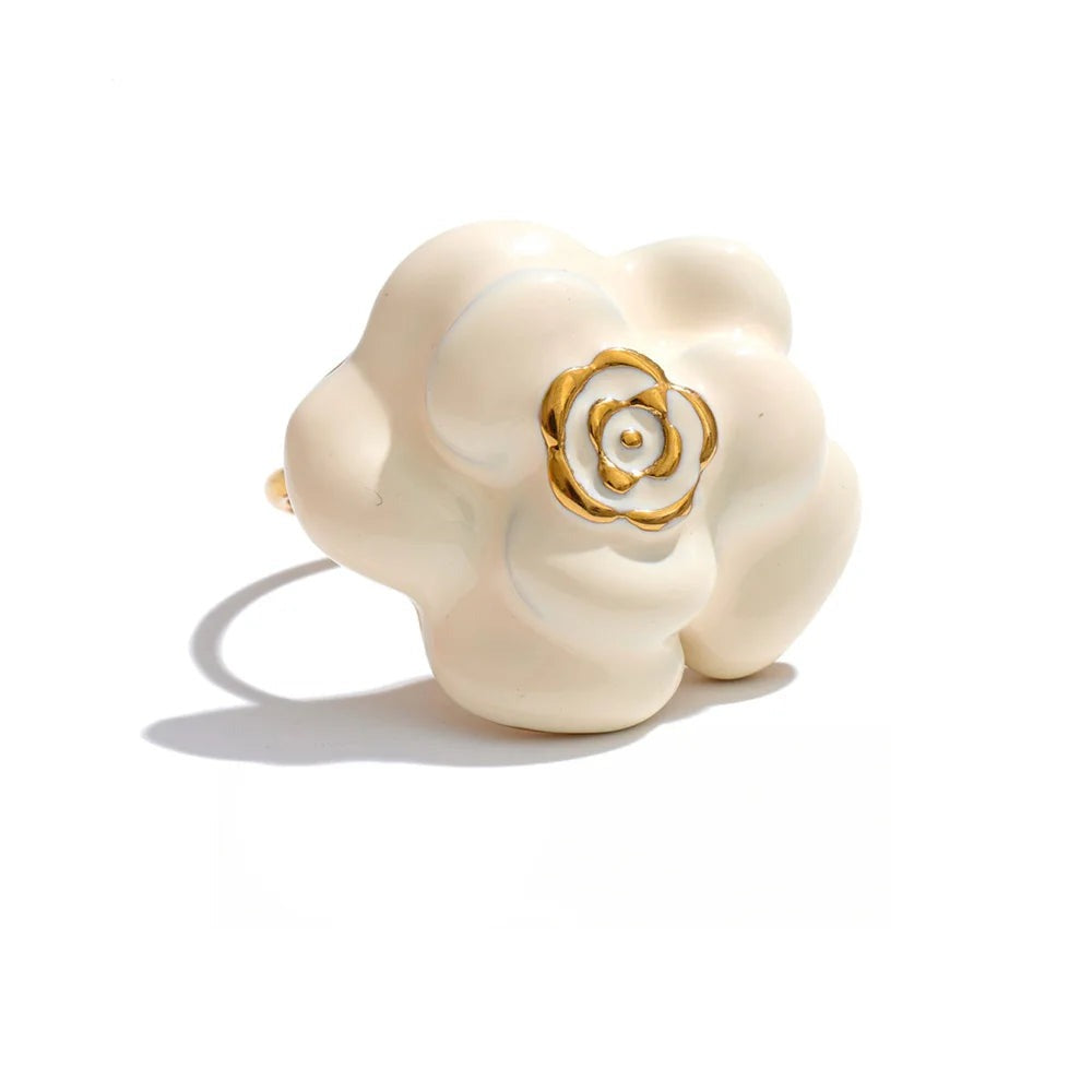 Gold-plated stainless steel ring with enamel flower design.