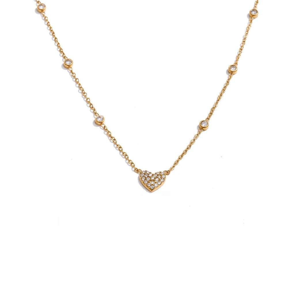 Gold-plated stainless steel necklace with cubic zirconia heart pendant.