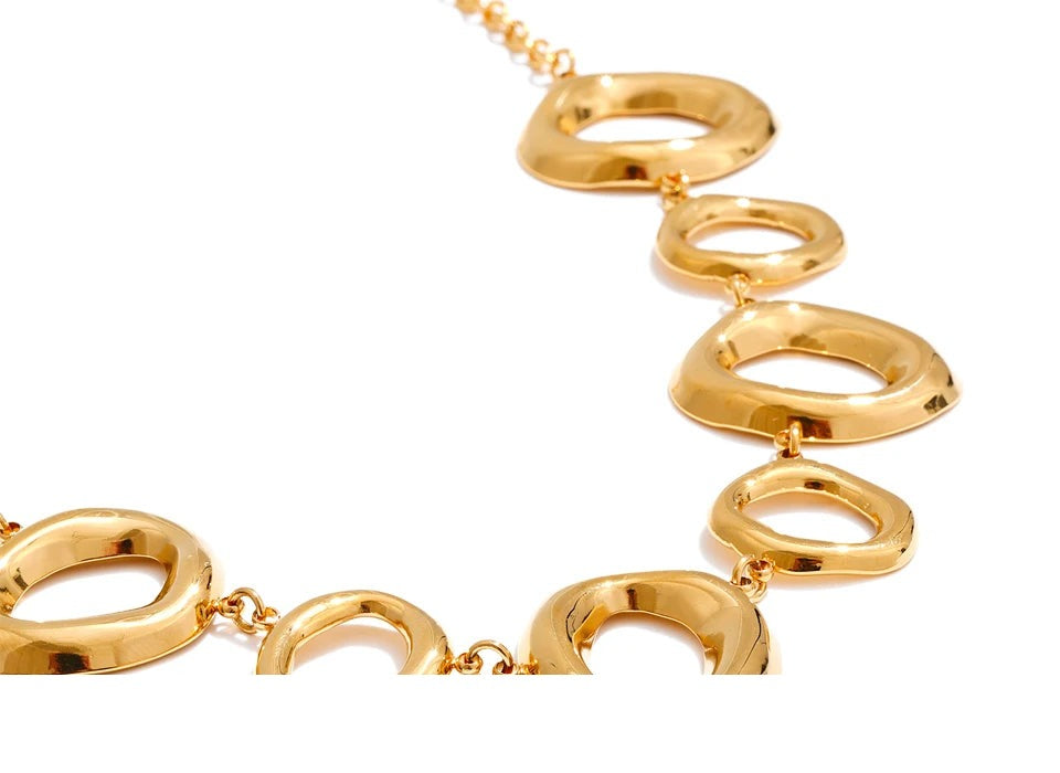 Cubic zirconia geometric chain necklace in gold-plated stainless steel with cubic zirconia.