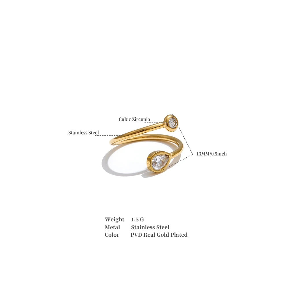 Cubic zirconia geometric ring in 18K gold-plated stainless steel with cubic zirconia.