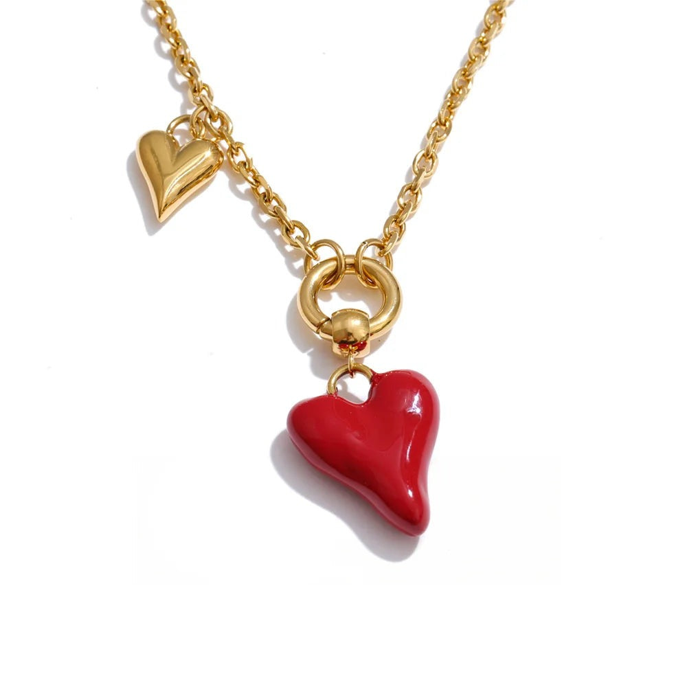 Gold-plated stainless steel necklace with red heart pendant.