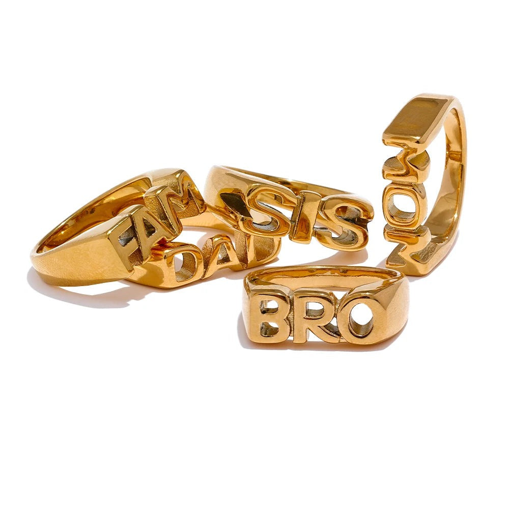 Gold-plated stainless steel ring set with personalized text.