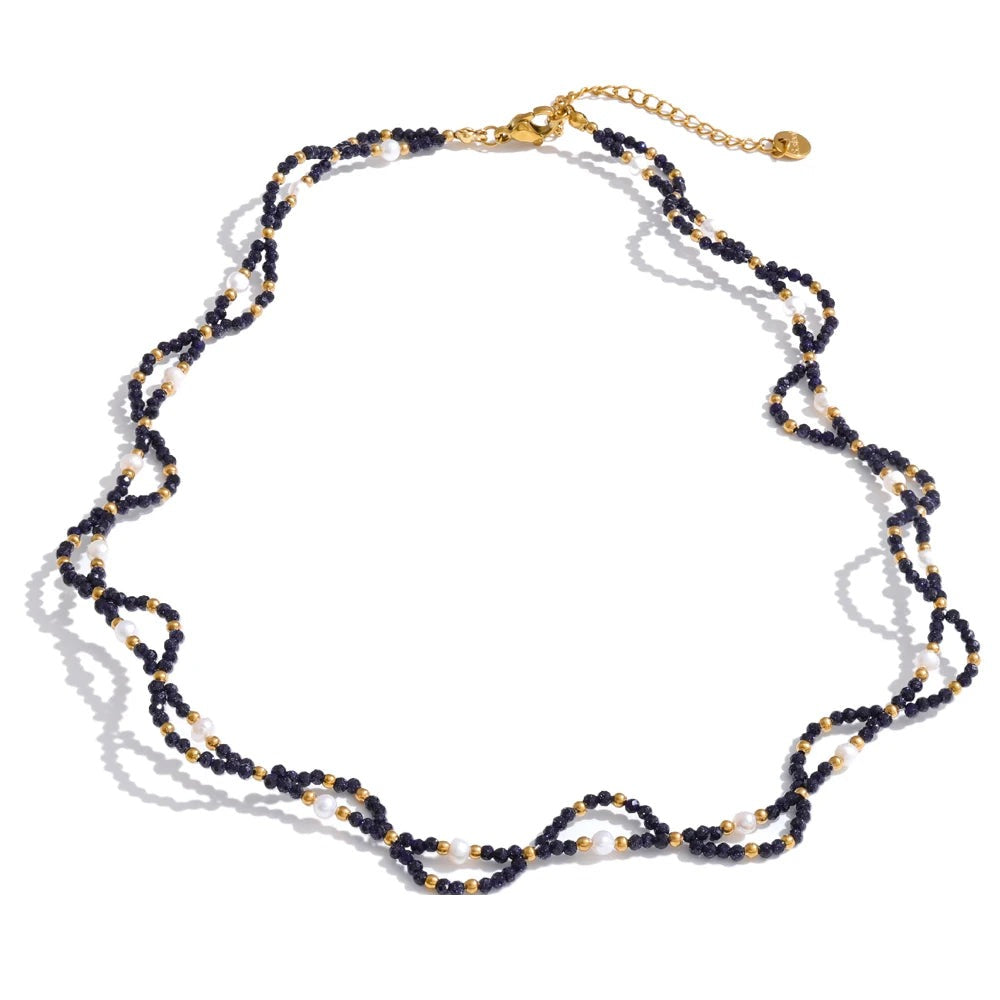 Pearl natural stone beaded necklace in gold-plated stainless steel with pearl and natural stone.