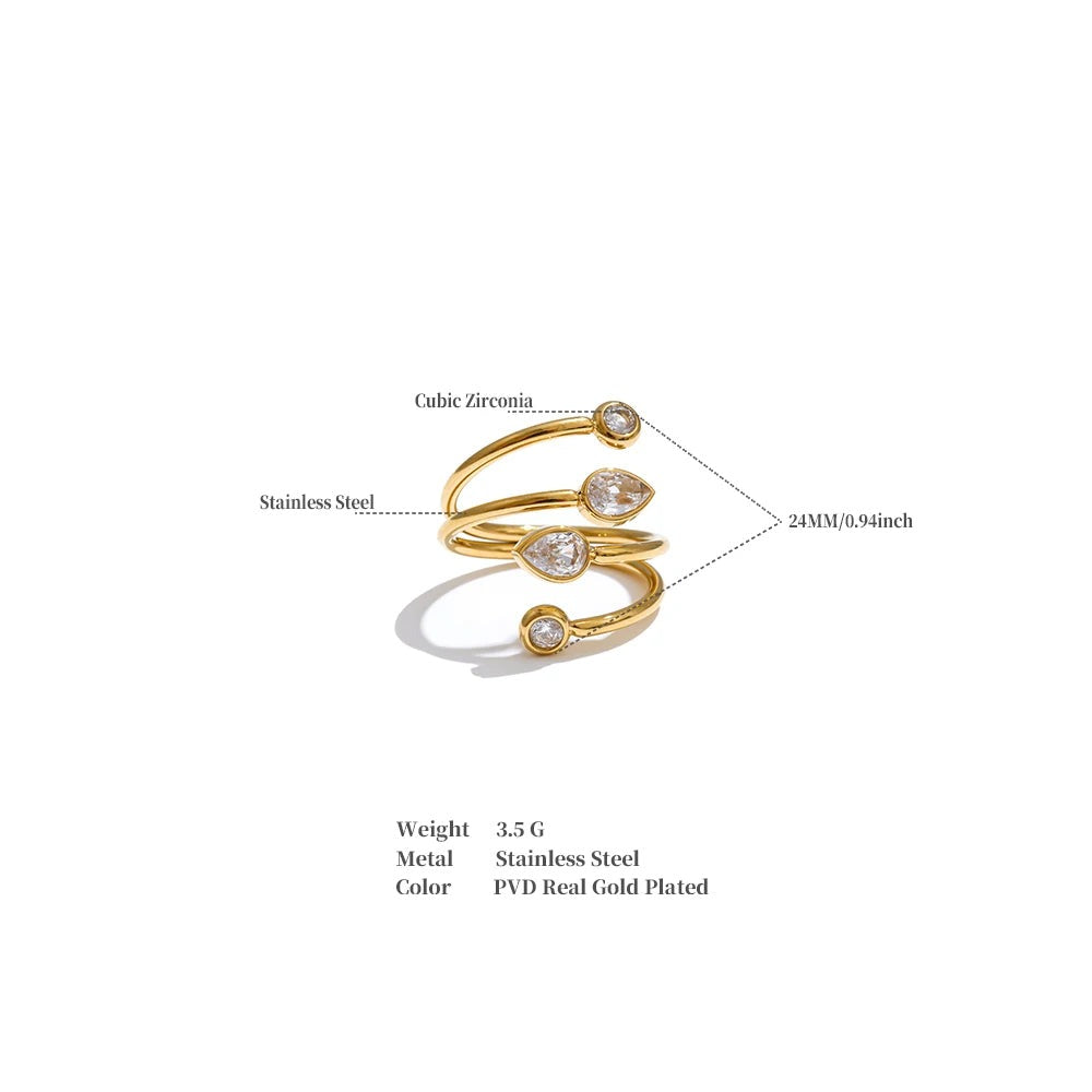 Cubic zirconia geometric layered ring in 18K gold-plated stainless steel with cubic zirconia.