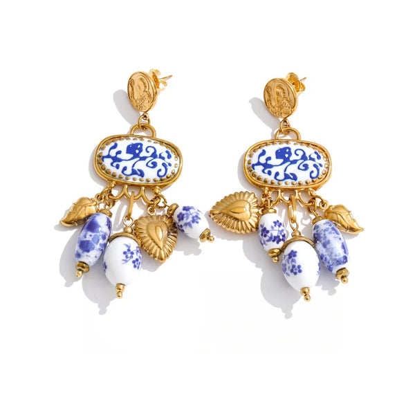 Gold-plated stainless steel earrings with blue and white floral design.