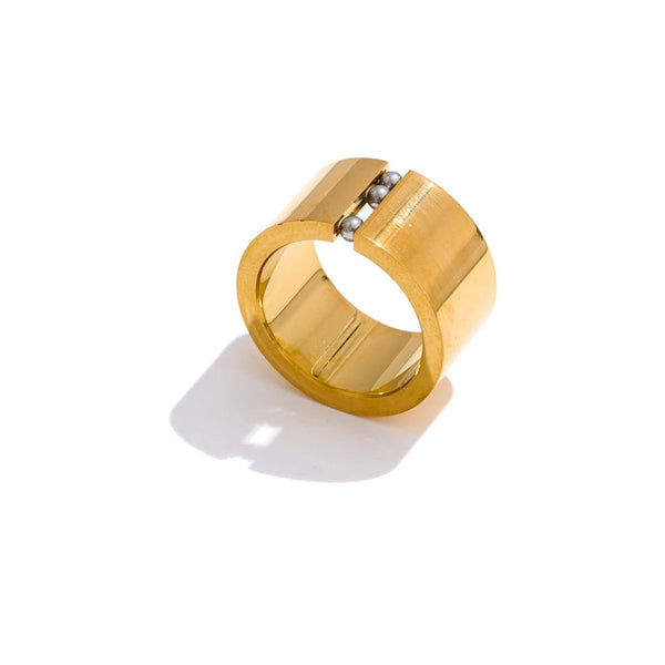 Gold-plated stainless steel ring with a large hole in the center.