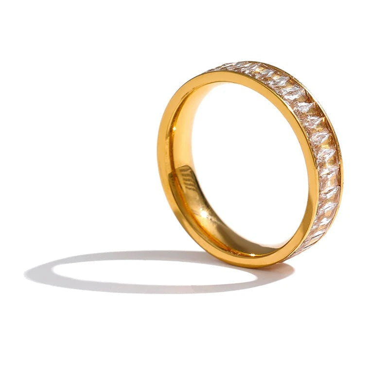 Gold-plated stainless steel ring with cubic zirconia.