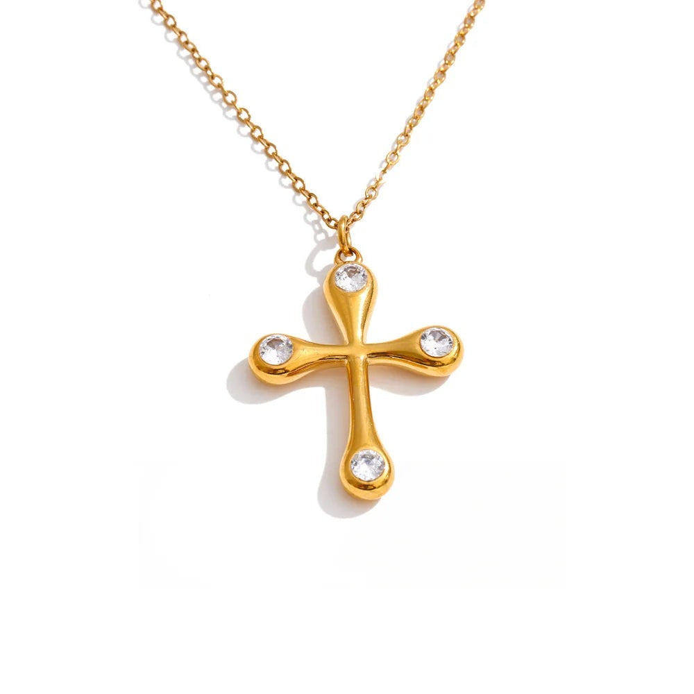 Gold-plated stainless steel cross necklace with cubic zirconia.