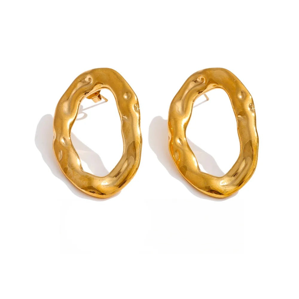 Gold-plated stainless steel earrings featuring a large, round hoop design.