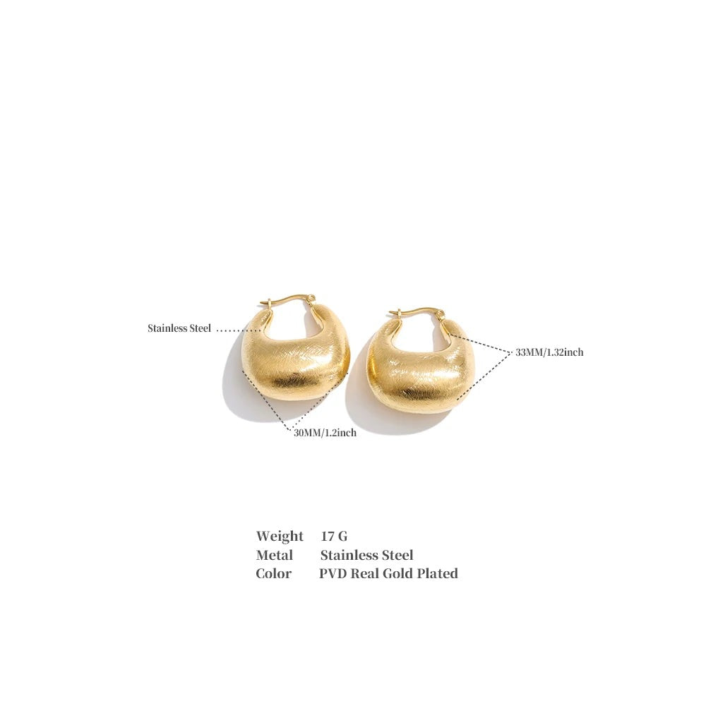 Geometric earrings in gold-plated stainless steel.