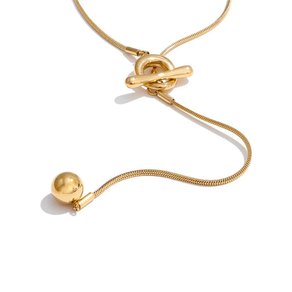 Gold-plated stainless steel necklace with a ball pendant.